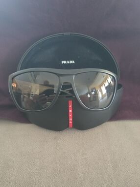 Prada Black Sunglasses with Smoky Lenses
